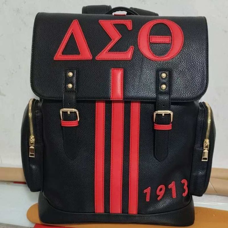 Additional pocket with silver engraved initials